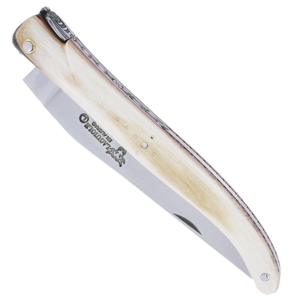 Couteau Laguiole en Aubrac 1 Pièce 12 cm Plein Manche en Ivoire de Mammouth Ressort et platines guillochés Mouche N°4