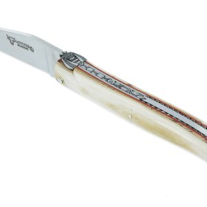 Couteau Laguiole en Aubrac 1 Pièce 12 cm Plein Manche en Ivoire de Mammouth Ressort et platines guillochés Mouche N°4