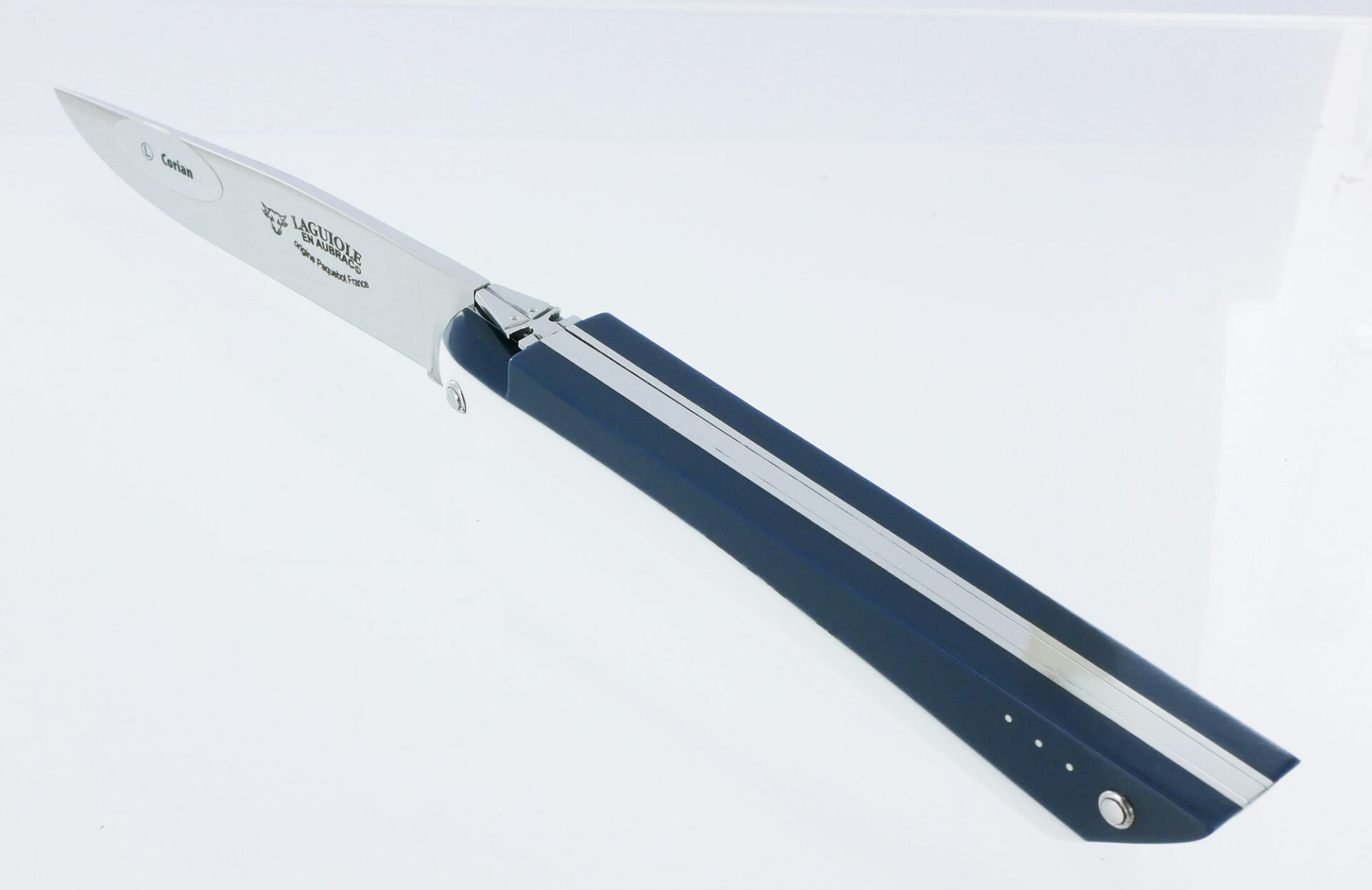 Couteau Laguiole en Aubrac Origine Paquebot FRANCE Plein Manche 12cm Corian Blanc et Bleu